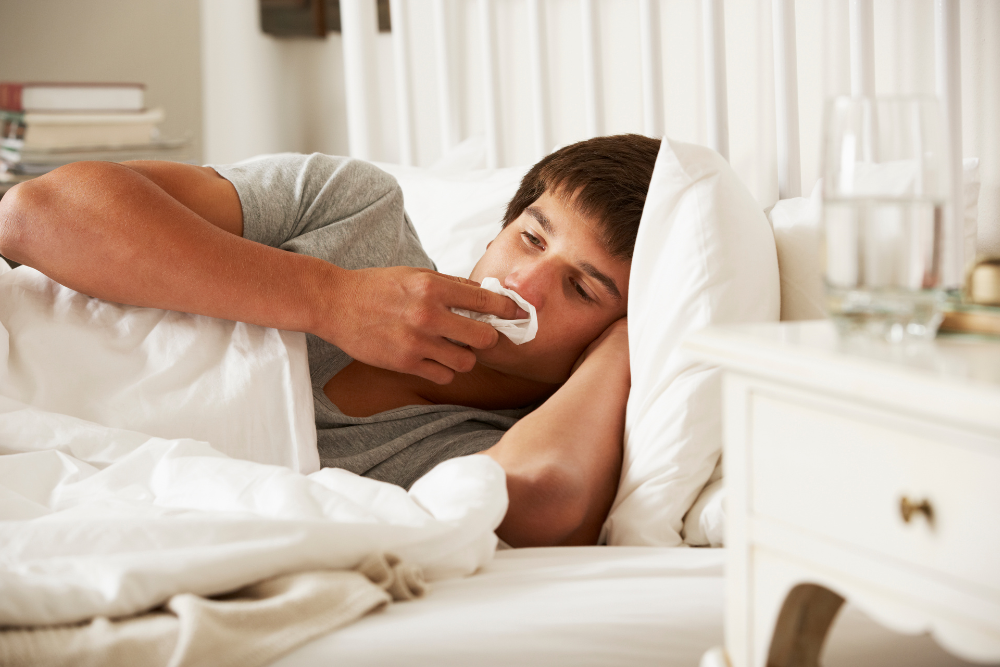 A teenage boy experiencing fatigue and symptoms of mono.