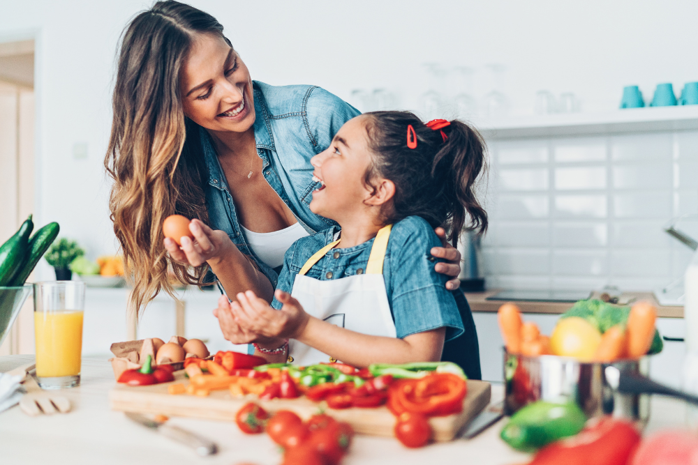 Mum and child eating well balanced meals to boost immunity.