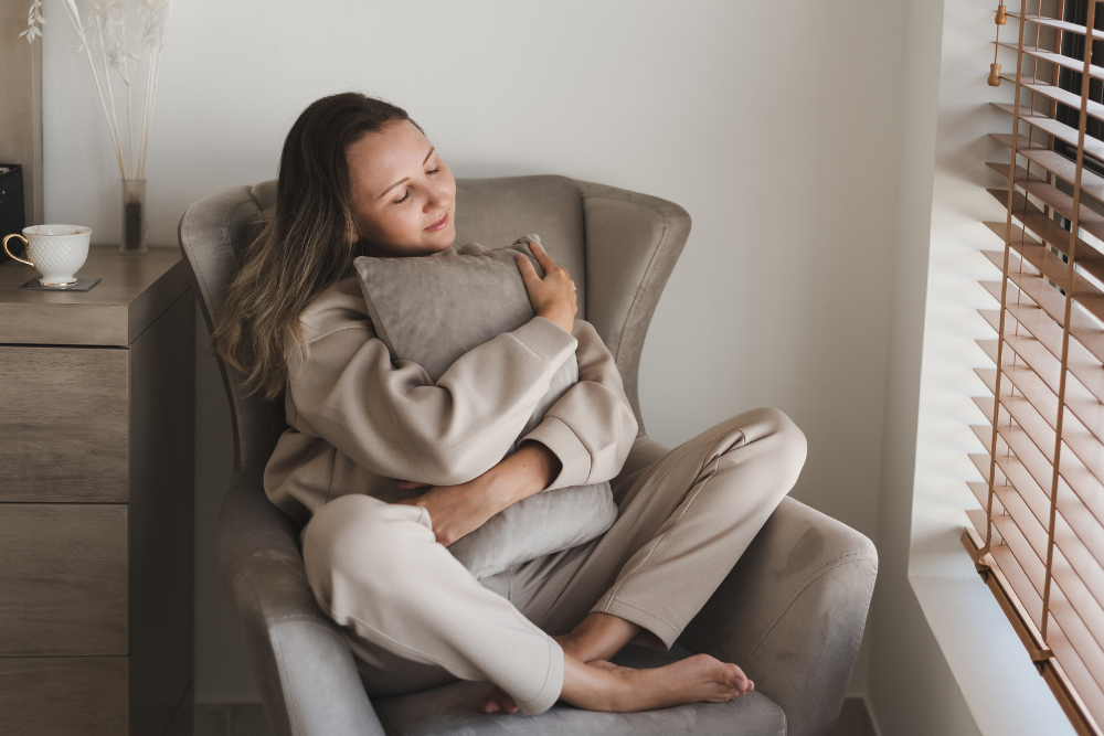 woman in breathable clothing on couch